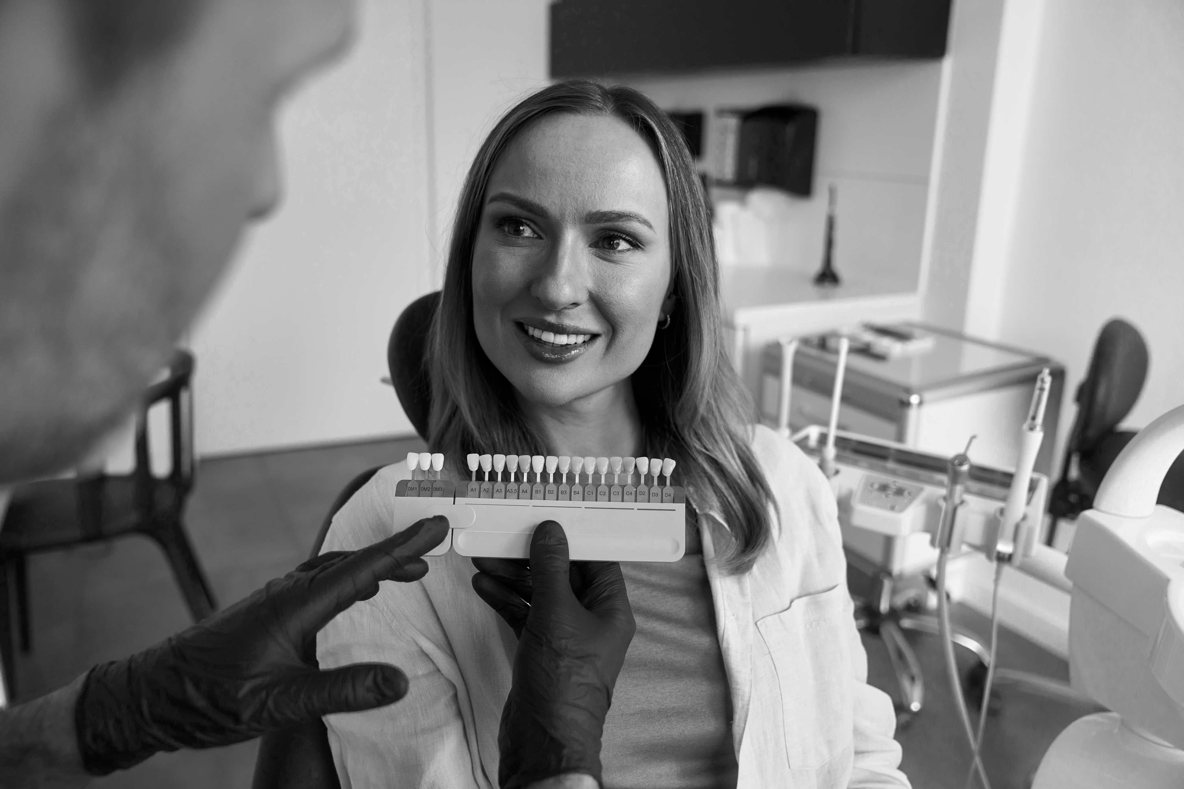 woman being advised about dental beauty whitening procedure